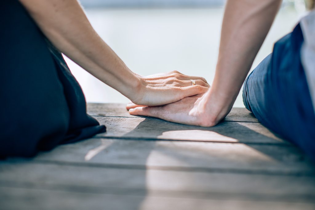 close up image young couple holding hands concept love family close