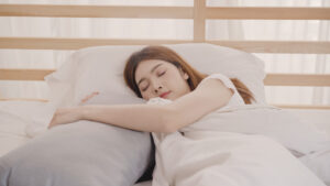 asian woman dreaming while sleeping bed bedroom