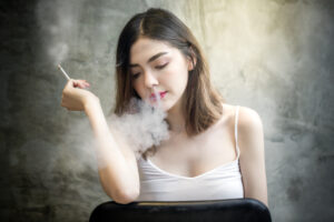 portrait beautiful girl smoking cigarette