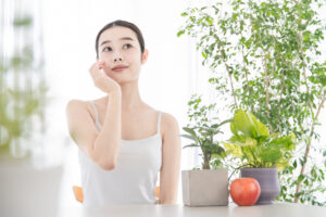 young woman checking her skin