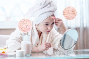 woman looking her dry skin with cracks with first wrinkles circles increase skin like magnifying magnifier