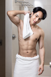 asian young handsome man model with towel bathroom